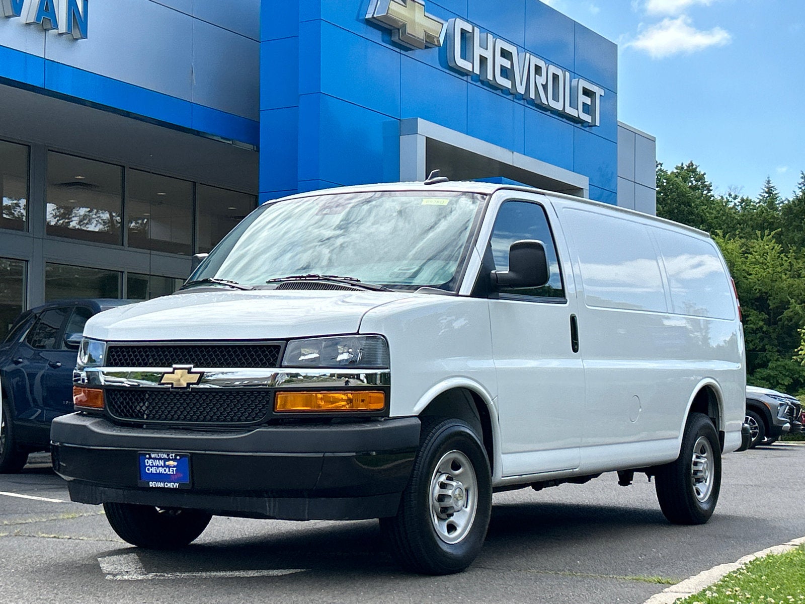 2024 Chevrolet Express Cargo 2500 WT in Summit White — front three-quarter view