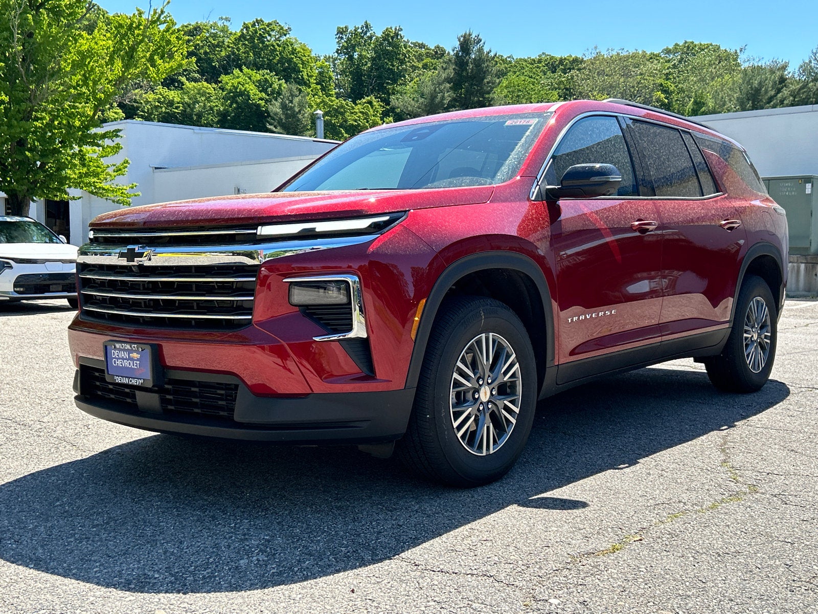 2026 Chevrolet Traverse LT in Radiant Red Tintcoat — front three-quarter view