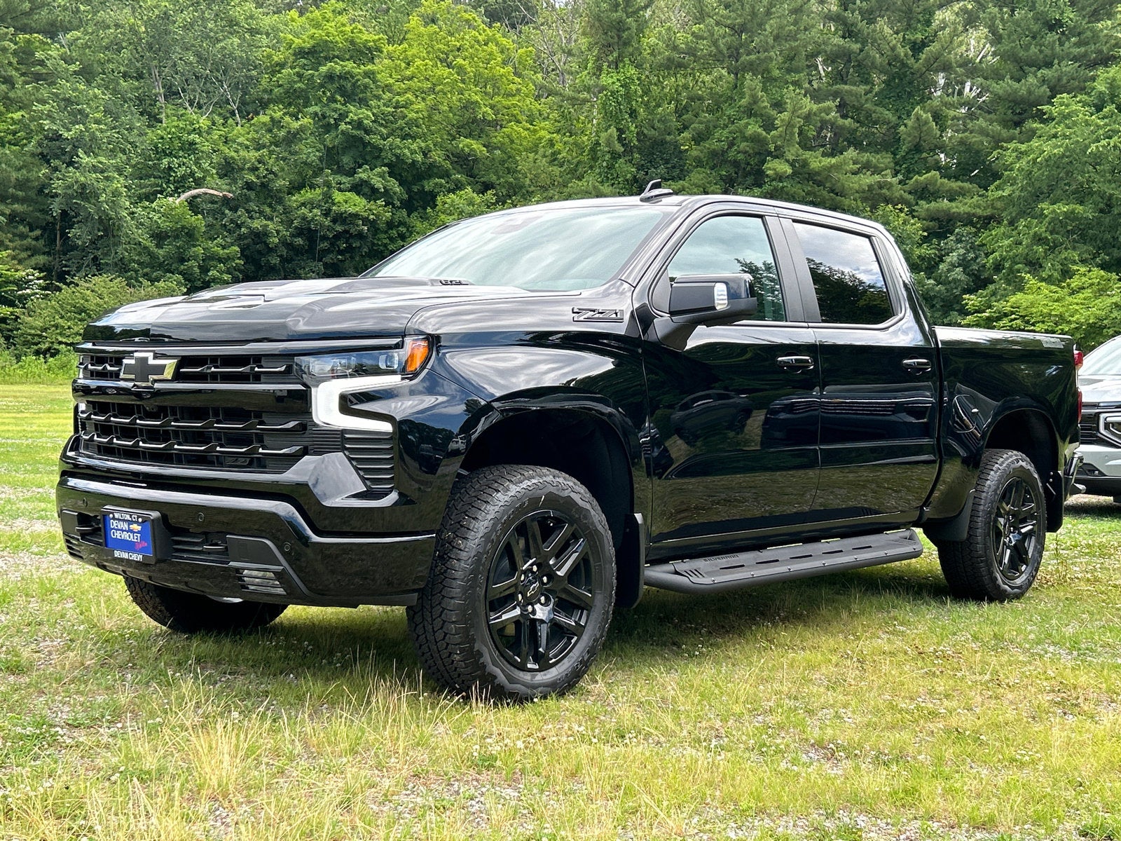 2026 Chevrolet Silverado 1500 LT Trail Boss in Black — front three-quarter view