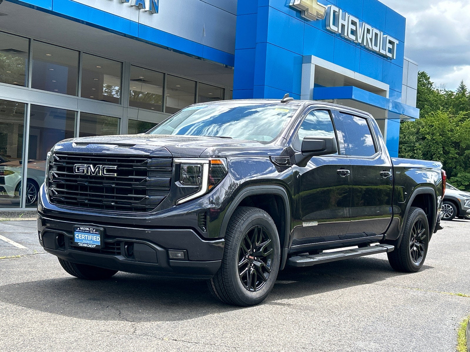2022 GMC Sierra 1500 Elevation in Titanium Rush Metallic — front three-quarter view